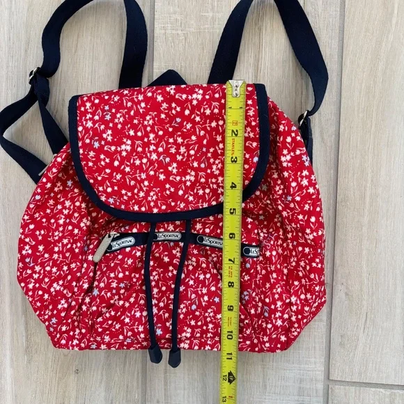 LeSportsac Small Edie Backpack in red  with a white and blue floral pattern. - Picture 11 of 12